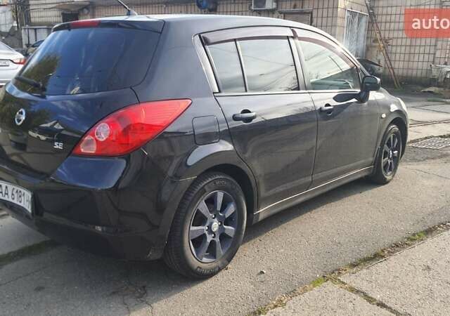 Черный Ниссан Тиида, объемом двигателя 1.6 л и пробегом 229 тыс. км за 5900 $, фото 8 на Automoto.ua