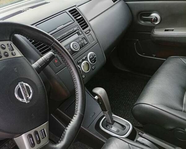 Черный Ниссан Тиида, объемом двигателя 1.6 л и пробегом 240 тыс. км за 7900 $, фото 7 на Automoto.ua