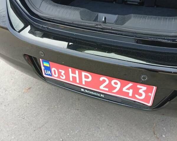 Черный Ниссан Тиида, объемом двигателя 1.6 л и пробегом 240 тыс. км за 7900 $, фото 21 на Automoto.ua