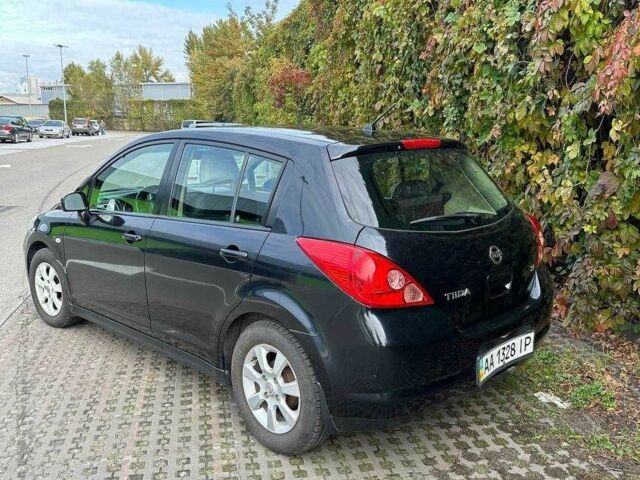 Черный Ниссан Тиида, объемом двигателя 1.6 л и пробегом 117 тыс. км за 7400 $, фото 6 на Automoto.ua