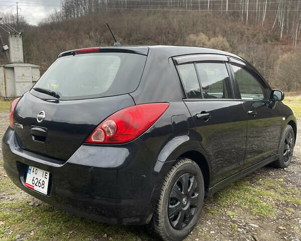 Черный Ниссан Тиида, объемом двигателя 1.6 л и пробегом 138 тыс. км за 6400 $, фото 13 на Automoto.ua