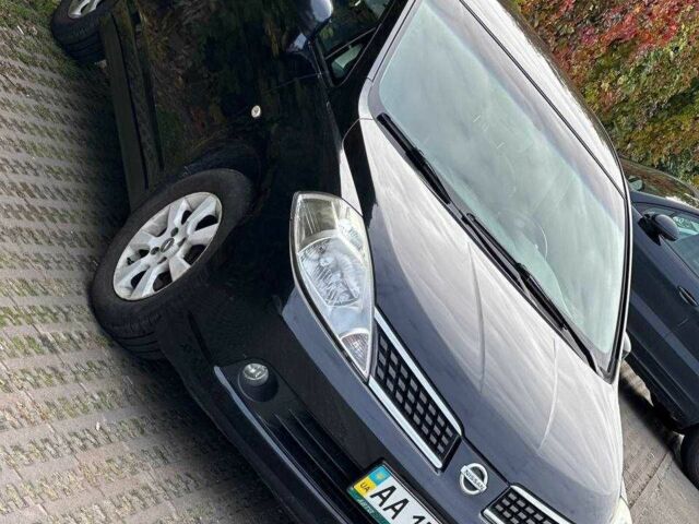 Черный Ниссан Тиида, объемом двигателя 1.6 л и пробегом 117 тыс. км за 7400 $, фото 3 на Automoto.ua