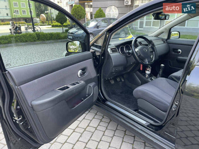 Черный Ниссан Тиида, объемом двигателя 1.8 л и пробегом 140 тыс. км за 6700 $, фото 7 на Automoto.ua