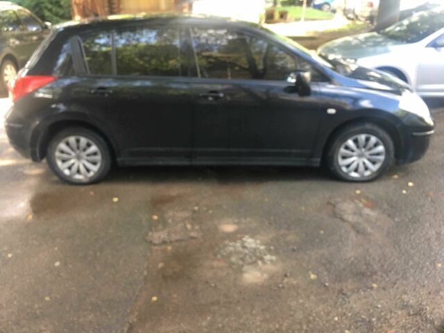 Чорний Ніссан Тііда, об'ємом двигуна 1.6 л та пробігом 156 тис. км за 4000 $, фото 1 на Automoto.ua