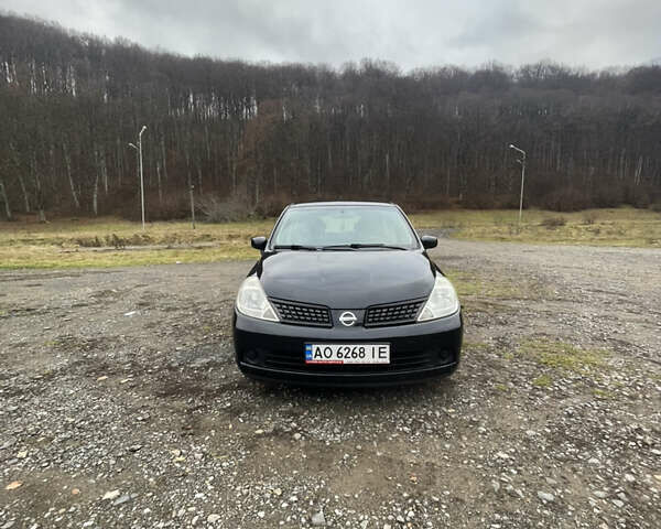 Черный Ниссан Тиида, объемом двигателя 1.6 л и пробегом 138 тыс. км за 6400 $, фото 4 на Automoto.ua