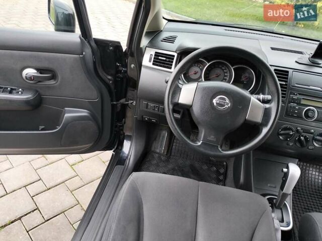 Чорний Ніссан Тііда, об'ємом двигуна 1.6 л та пробігом 114 тис. км за 6729 $, фото 10 на Automoto.ua