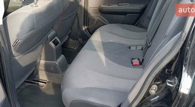 Черный Ниссан Тиида, объемом двигателя 1.6 л и пробегом 300 тыс. км за 4550 $, фото 7 на Automoto.ua