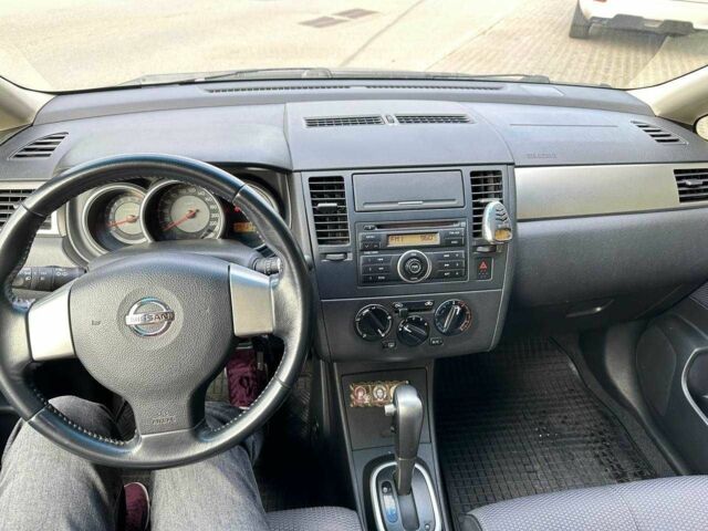 Черный Ниссан Тиида, объемом двигателя 1.6 л и пробегом 117 тыс. км за 7400 $, фото 9 на Automoto.ua