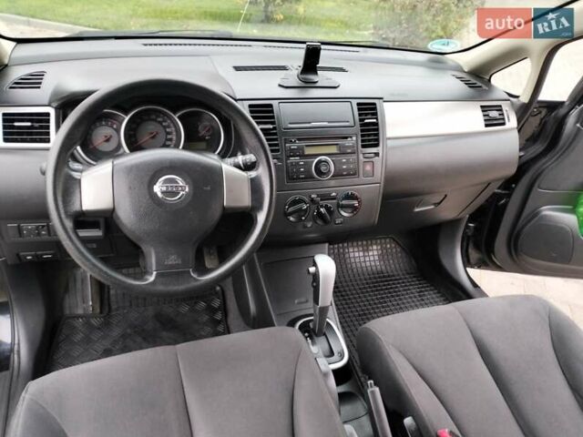 Черный Ниссан Тиида, объемом двигателя 1.6 л и пробегом 114 тыс. км за 6900 $, фото 42 на Automoto.ua