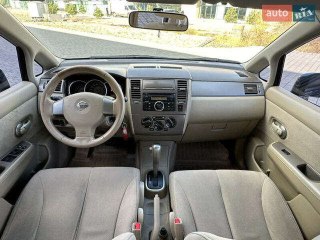 Черный Ниссан Тиида, объемом двигателя 1.6 л и пробегом 169 тыс. км за 6200 $, фото 9 на Automoto.ua