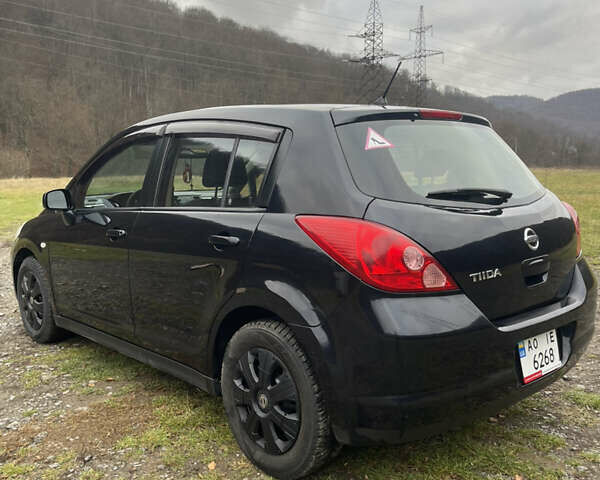 Черный Ниссан Тиида, объемом двигателя 1.6 л и пробегом 138 тыс. км за 6400 $, фото 9 на Automoto.ua
