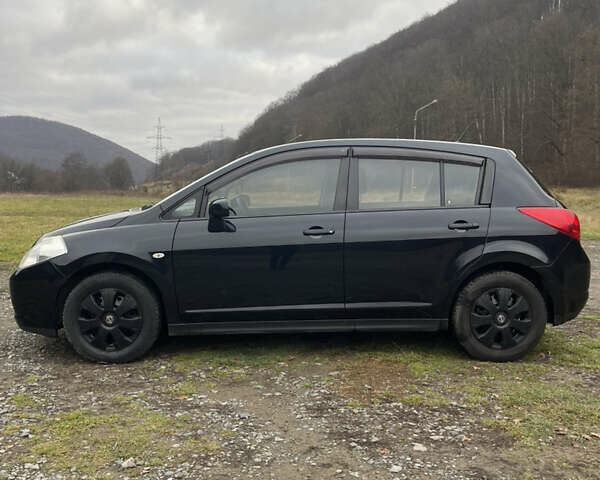 Черный Ниссан Тиида, объемом двигателя 1.6 л и пробегом 138 тыс. км за 6400 $, фото 7 на Automoto.ua