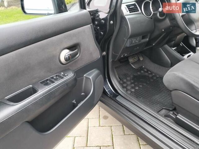 Черный Ниссан Тиида, объемом двигателя 1.6 л и пробегом 114 тыс. км за 6900 $, фото 30 на Automoto.ua