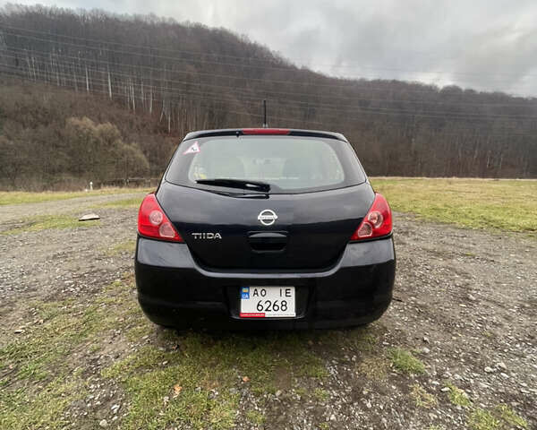 Черный Ниссан Тиида, объемом двигателя 1.6 л и пробегом 138 тыс. км за 6400 $, фото 12 на Automoto.ua