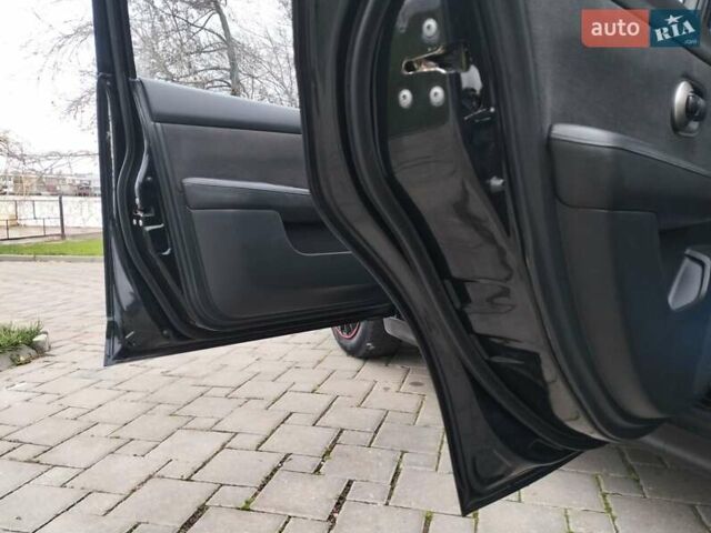 Черный Ниссан Тиида, объемом двигателя 1.6 л и пробегом 114 тыс. км за 6900 $, фото 43 на Automoto.ua
