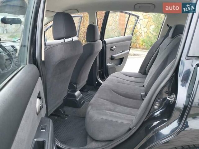 Черный Ниссан Тиида, объемом двигателя 1.6 л и пробегом 114 тыс. км за 6900 $, фото 24 на Automoto.ua