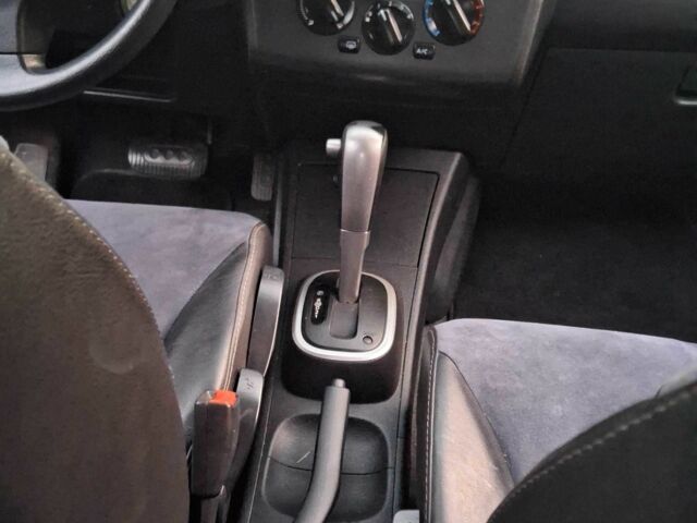 Черный Ниссан Тиида, объемом двигателя 0 л и пробегом 110 тыс. км за 7200 $, фото 12 на Automoto.ua