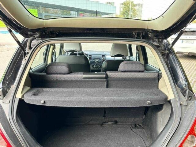 Черный Ниссан Тиида, объемом двигателя 1.6 л и пробегом 117 тыс. км за 7400 $, фото 18 на Automoto.ua