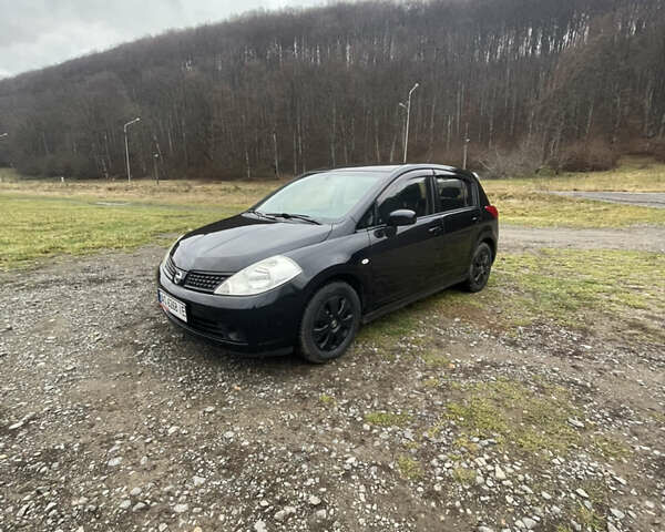 Черный Ниссан Тиида, объемом двигателя 1.6 л и пробегом 138 тыс. км за 6400 $, фото 6 на Automoto.ua