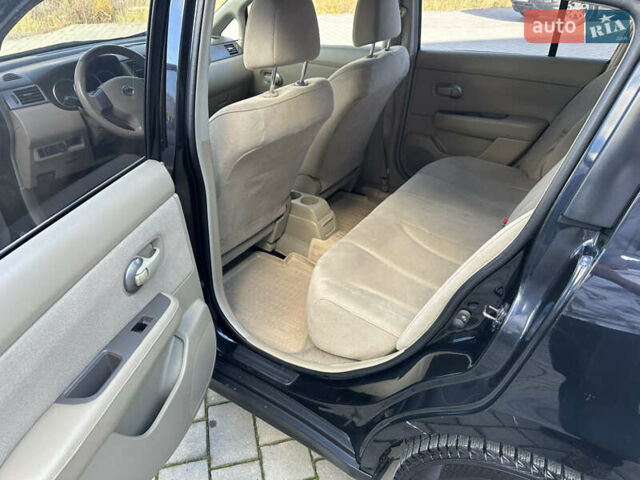 Черный Ниссан Тиида, объемом двигателя 1.6 л и пробегом 169 тыс. км за 6200 $, фото 11 на Automoto.ua