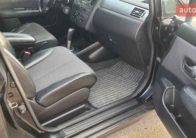 Черный Ниссан Тиида, объемом двигателя 1.6 л и пробегом 229 тыс. км за 5900 $, фото 7 на Automoto.ua