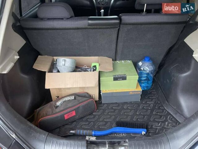 Черный Ниссан Тиида, объемом двигателя 1.6 л и пробегом 188 тыс. км за 6700 $, фото 18 на Automoto.ua