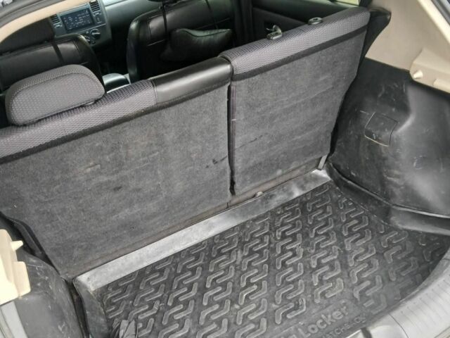 Черный Ниссан Тиида, объемом двигателя 1.6 л и пробегом 220 тыс. км за 5498 $, фото 6 на Automoto.ua