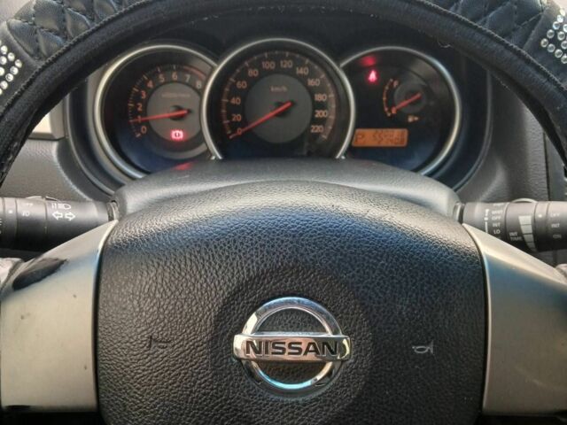 Черный Ниссан Тиида, объемом двигателя 1.6 л и пробегом 220 тыс. км за 5498 $, фото 5 на Automoto.ua