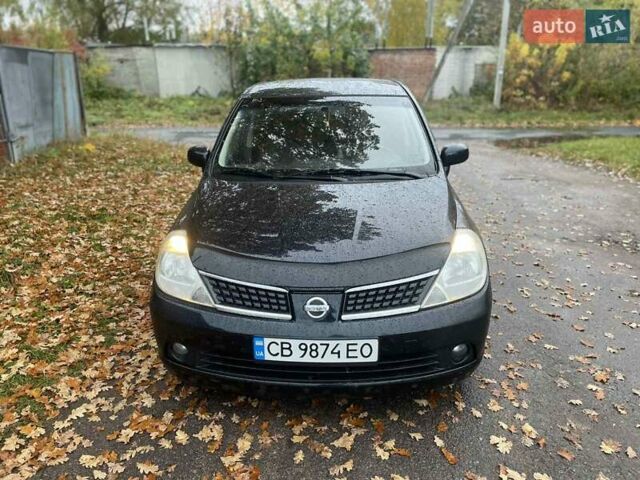 Черный Ниссан Тиида, объемом двигателя 1.6 л и пробегом 188 тыс. км за 6700 $, фото 3 на Automoto.ua