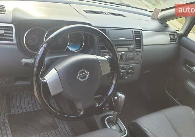 Черный Ниссан Тиида, объемом двигателя 1.6 л и пробегом 229 тыс. км за 5900 $, фото 1 на Automoto.ua