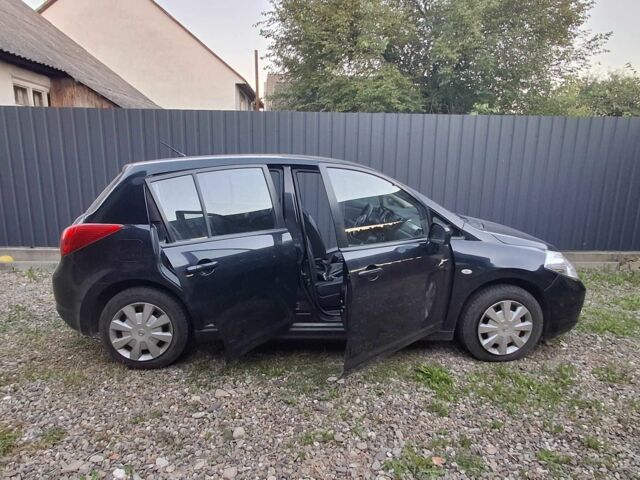 Черный Ниссан Тиида, объемом двигателя 0 л и пробегом 110 тыс. км за 7200 $, фото 1 на Automoto.ua