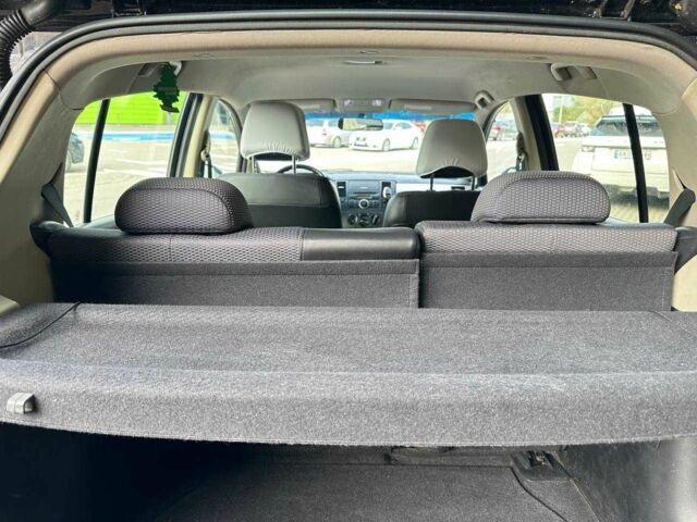 Черный Ниссан Тиида, объемом двигателя 1.6 л и пробегом 117 тыс. км за 7400 $, фото 20 на Automoto.ua