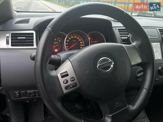 Черный Ниссан Тиида, объемом двигателя 1.6 л и пробегом 129 тыс. км за 5500 $, фото 4 на Automoto.ua