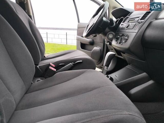 Чорний Ніссан Тііда, об'ємом двигуна 1.6 л та пробігом 114 тис. км за 6400 $, фото 21 на Automoto.ua