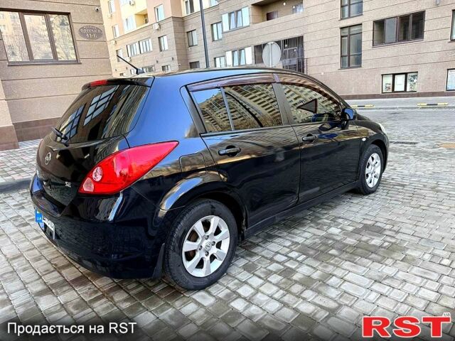 Черный Ниссан Тиида, объемом двигателя 1.6 л и пробегом 282 тыс. км за 4950 $, фото 4 на Automoto.ua