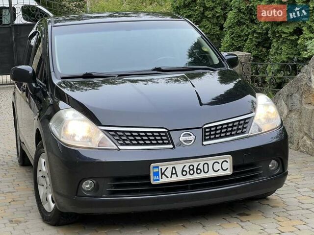 Черный Ниссан Тиида, объемом двигателя 1.6 л и пробегом 84 тыс. км за 7200 $, фото 1 на Automoto.ua