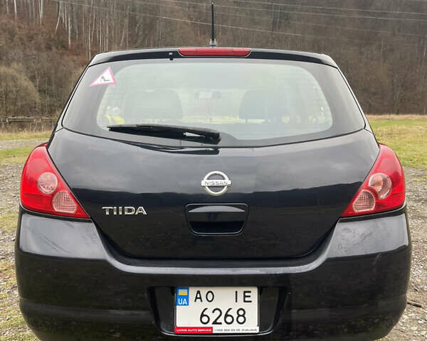 Черный Ниссан Тиида, объемом двигателя 1.6 л и пробегом 138 тыс. км за 6400 $, фото 11 на Automoto.ua