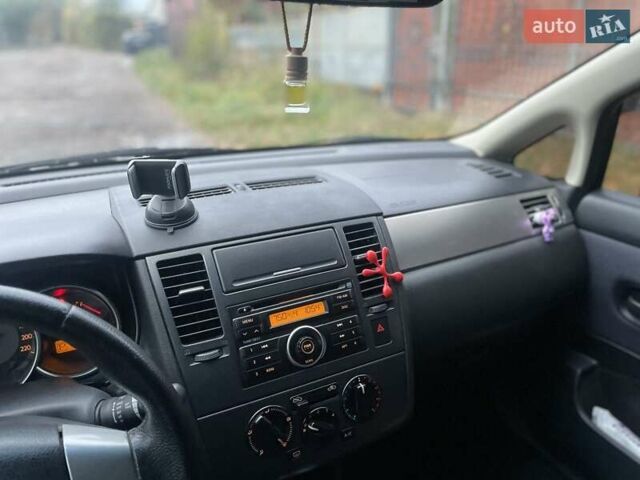 Черный Ниссан Тиида, объемом двигателя 1.6 л и пробегом 188 тыс. км за 6700 $, фото 7 на Automoto.ua