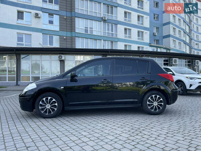 Черный Ниссан Тиида, объемом двигателя 1.8 л и пробегом 140 тыс. км за 6700 $, фото 2 на Automoto.ua