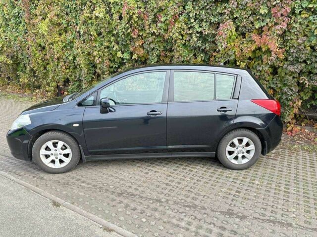 Черный Ниссан Тиида, объемом двигателя 1.6 л и пробегом 117 тыс. км за 7400 $, фото 7 на Automoto.ua