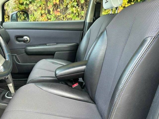 Черный Ниссан Тиида, объемом двигателя 1.6 л и пробегом 117 тыс. км за 7400 $, фото 11 на Automoto.ua