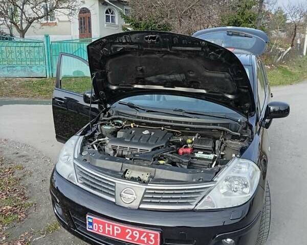 Черный Ниссан Тиида, объемом двигателя 1.6 л и пробегом 240 тыс. км за 7900 $, фото 13 на Automoto.ua