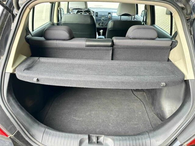 Черный Ниссан Тиида, объемом двигателя 1.6 л и пробегом 117 тыс. км за 7400 $, фото 19 на Automoto.ua