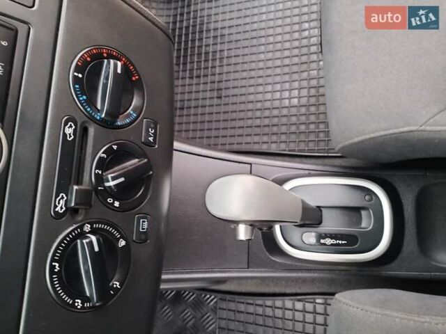 Чорний Ніссан Тііда, об'ємом двигуна 1.6 л та пробігом 114 тис. км за 6729 $, фото 11 на Automoto.ua