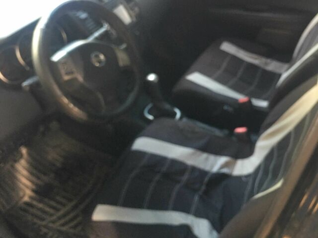 Чорний Ніссан Тііда, об'ємом двигуна 1.6 л та пробігом 156 тис. км за 4000 $, фото 3 на Automoto.ua