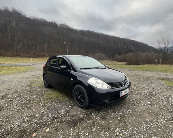 Черный Ниссан Тиида, объемом двигателя 1.6 л и пробегом 138 тыс. км за 6400 $, фото 1 на Automoto.ua