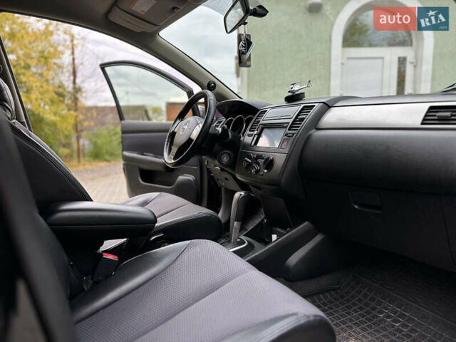 Чорний Ніссан Тііда, об'ємом двигуна 1.6 л та пробігом 179 тис. км за 5500 $, фото 8 на Automoto.ua
