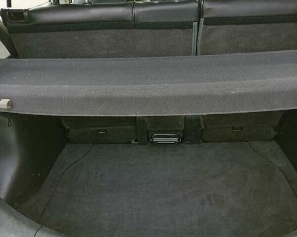 Черный Ниссан Тиида, объемом двигателя 1.6 л и пробегом 240 тыс. км за 7900 $, фото 5 на Automoto.ua