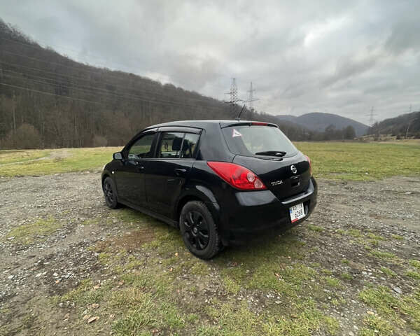 Черный Ниссан Тиида, объемом двигателя 1.6 л и пробегом 138 тыс. км за 6400 $, фото 10 на Automoto.ua