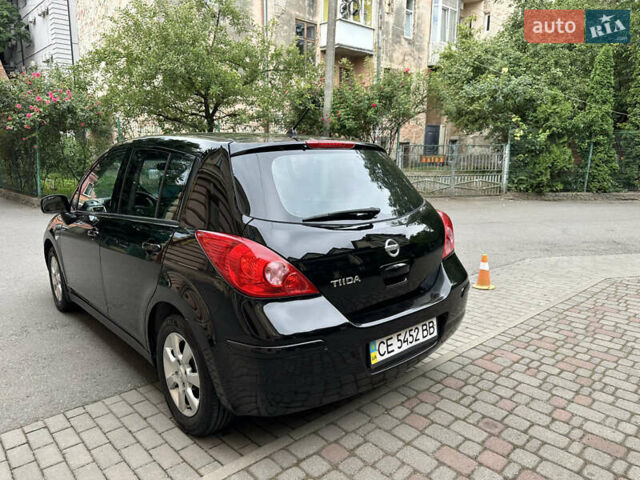 Чорний Ніссан Тііда, об'ємом двигуна 1.6 л та пробігом 220 тис. км за 6200 $, фото 7 на Automoto.ua